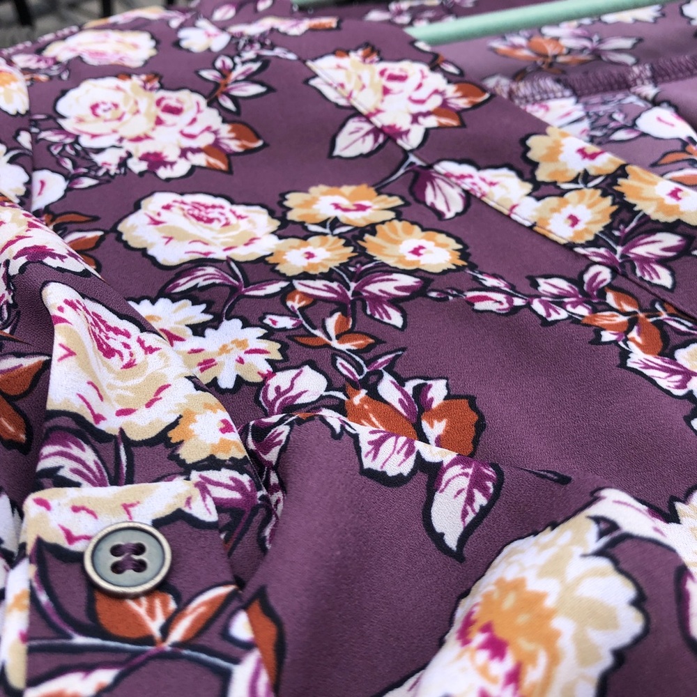 Plum floral blouse.
